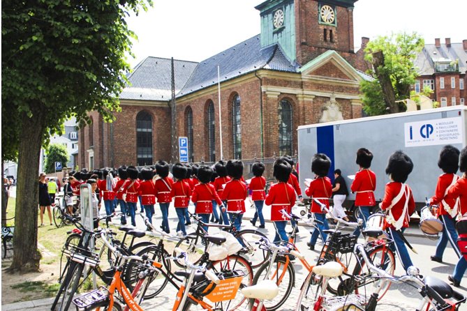 Copenhagen 2-hour City Highlights Bike Tour - The bikes, poncho setup, and how safety actually works on this route